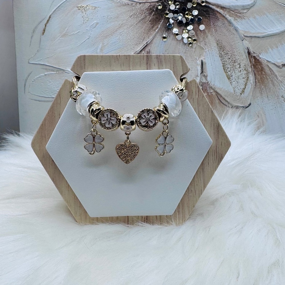 The Heart of Charms: Flower & Heart Charms Bracelet